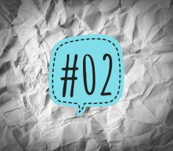 Links der Woche 02/2018 - türkise Sprechblase mit der Nummer 2 auf verknittertem Papier